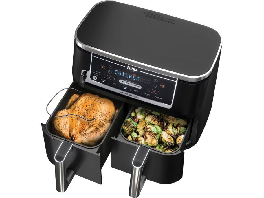 Ninja Foodi 6-in-1 10-Quart XL 2-Basket Air Fryer with drawers open with food in them