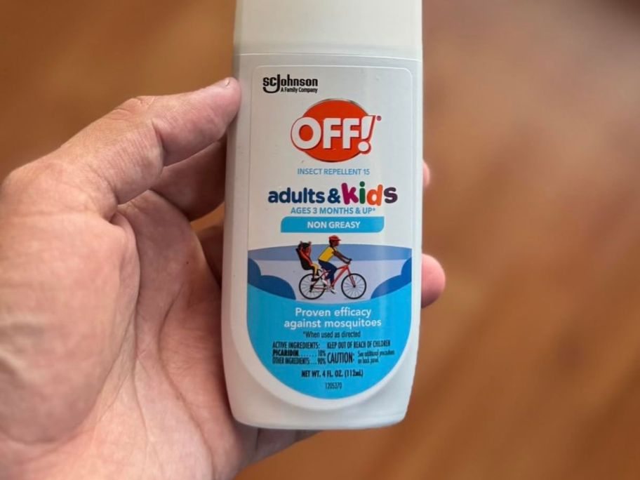 hand holding OFF! Insect Repellant Spritz 4oz bottle