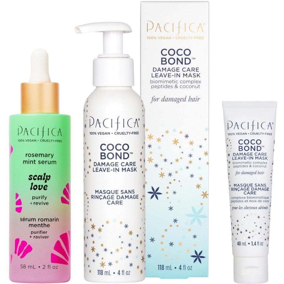 a bottle of scalp serum, a bottle of leave-in hair mask, and a mini leave-in hair mask
