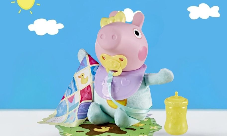 baby evie pig with bottle, pacifier, and blanket