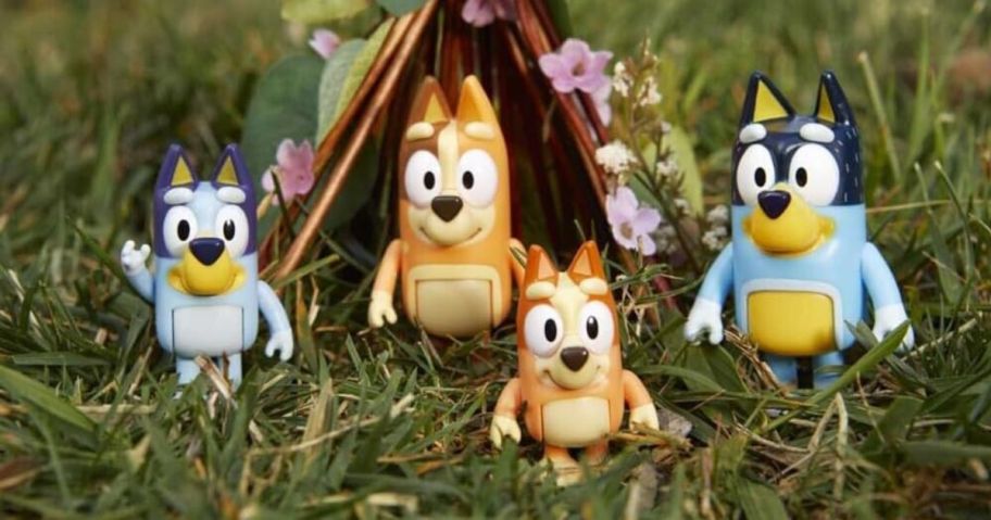bluey figures in grass