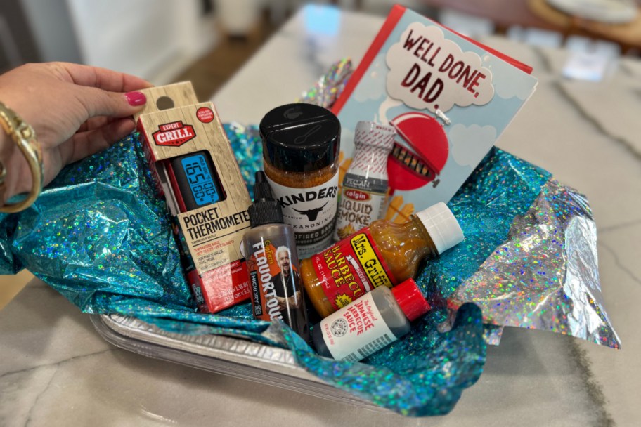 mini sauces and spices in metal pan with cellophane