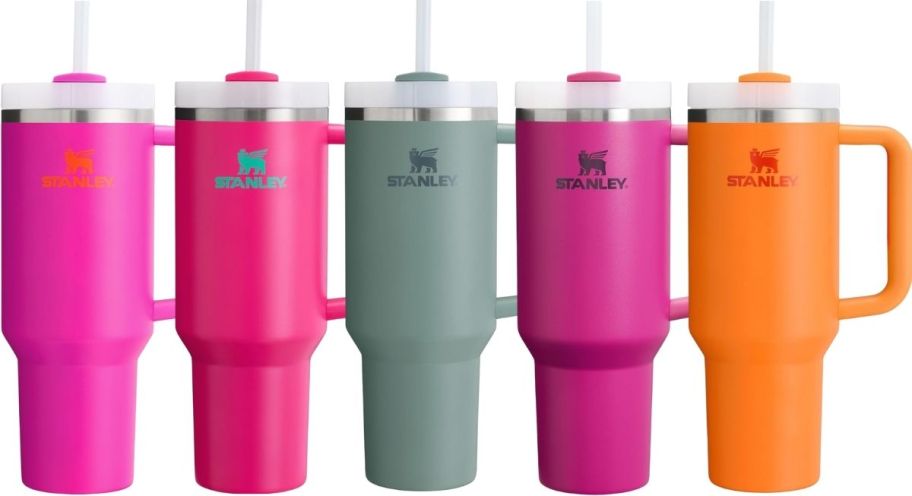 5 stanley 40 oz tumbler bottles in various colors
