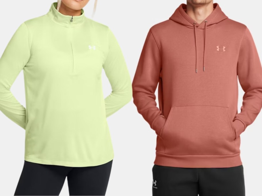 woman and man wearing Under Armour sweatshirts and hoodie