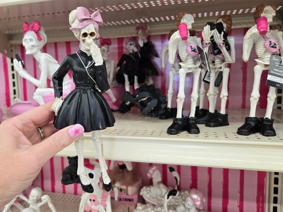 Ashland Skeleton in Black Dress with Cat, Skeleton with Tumbler, Cowgirl Skeleton on a Toilet, Book Stack Skeleton with Makeup, Bathing Skeleton