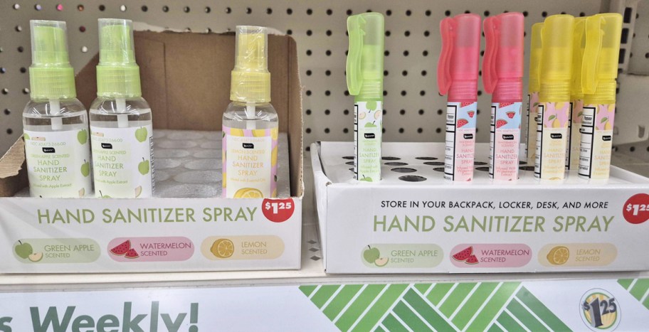 bottles of hand sanitizer sprays on store shelf
