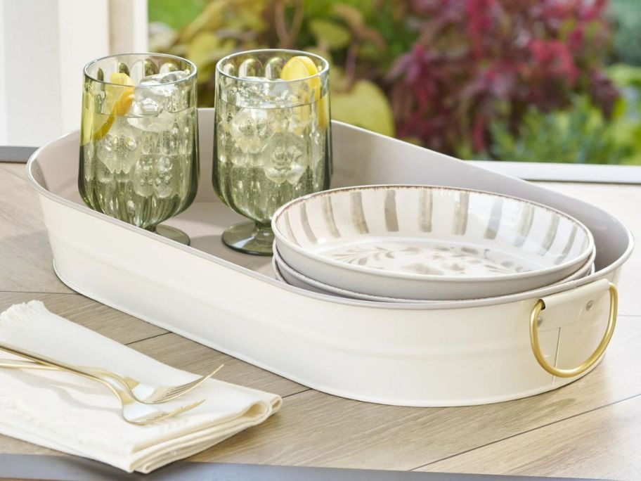 An oval serving tray on a table