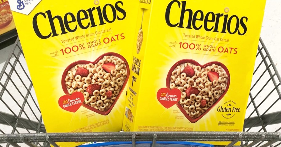 two yellow boxes of Cheerios Cereal in shopping cart