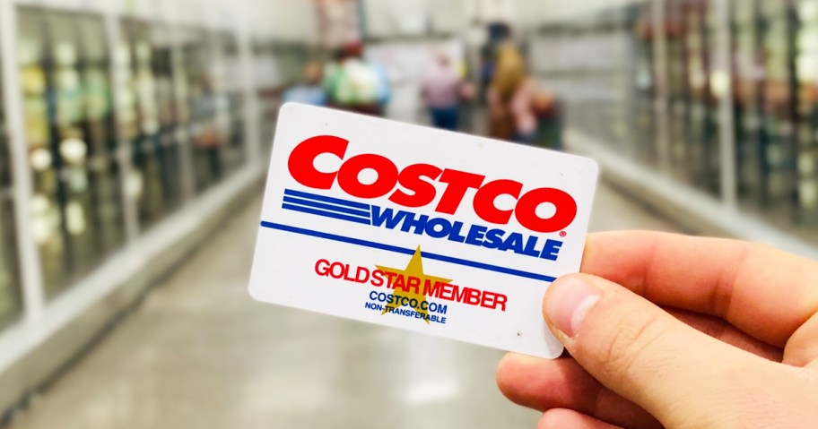 hand holding up a Costco gold star membership card