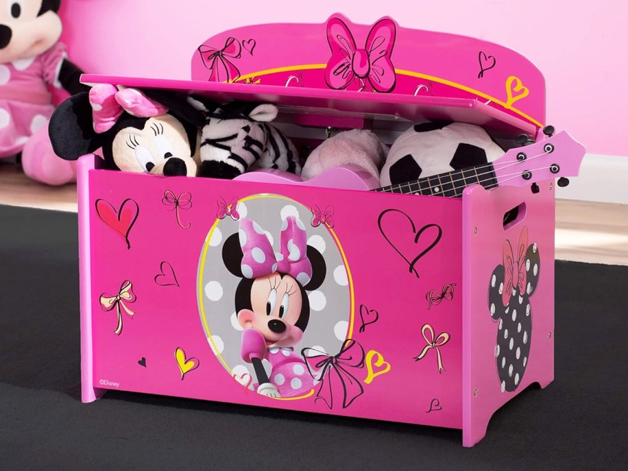 pink minnie mouse toy box in playroom