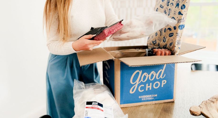 woman taking items out of her good job box 