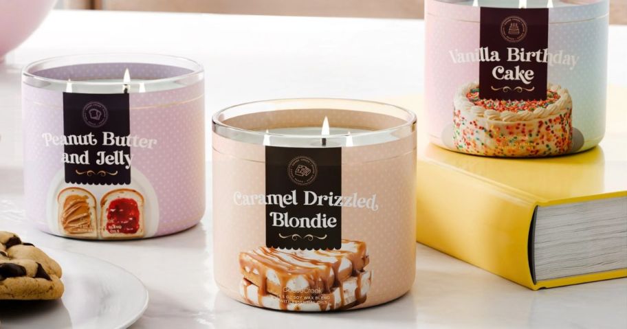 3 Goosecreek 3-wick candles on a kitchen island