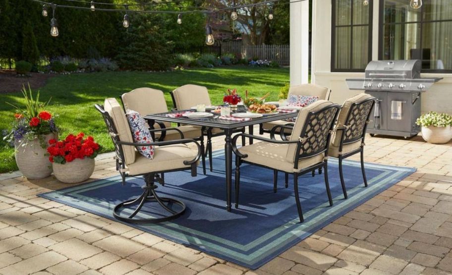 7 piece patio dining set with beige cushions