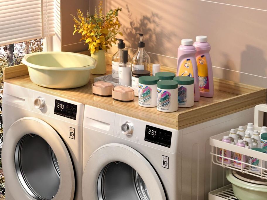 HeyCody Washer & Dryer Countertop in Natural topped with laundry essentials