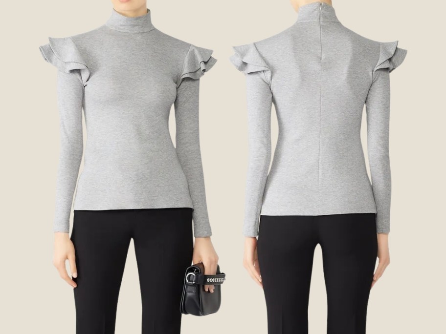 a woman in a gray sweater with ruffled shoulders