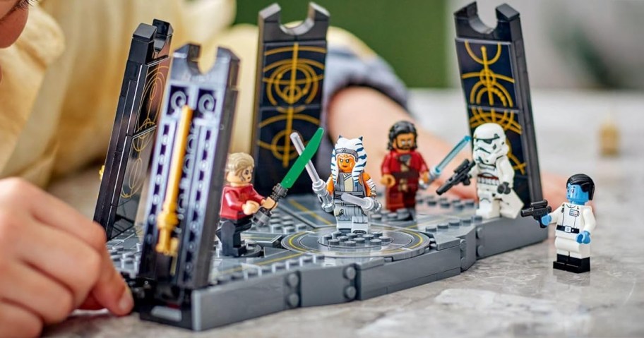 LEGO Star Wars Ahsoka Tano’s Duel on Peridea Building Set being played with by a boy