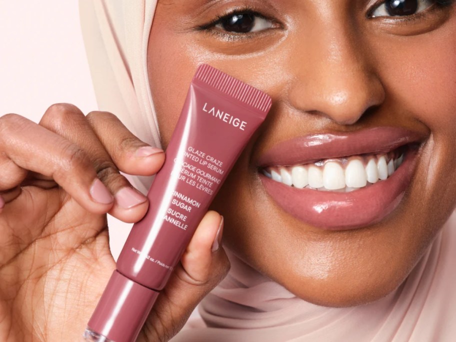 woman holding laneige tinted lip balm