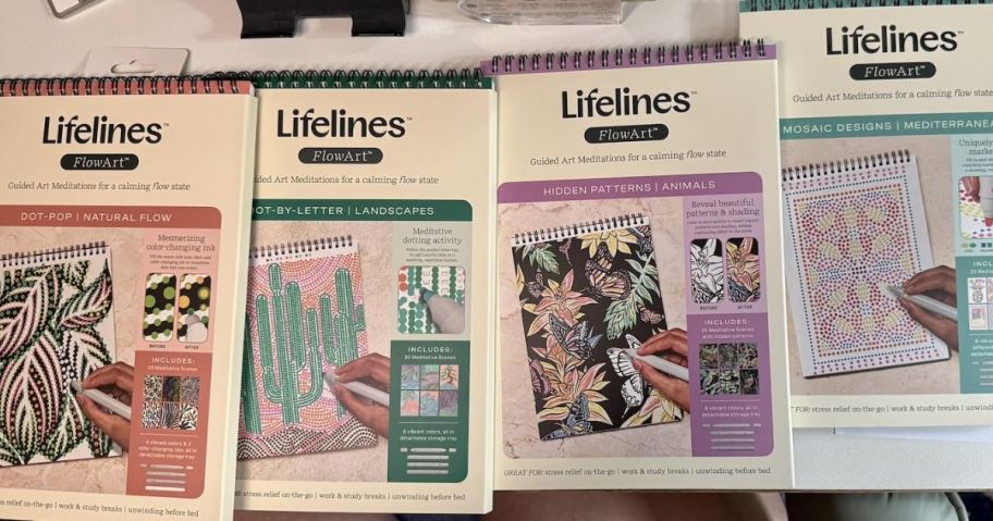 4 art pads with pictures on them 