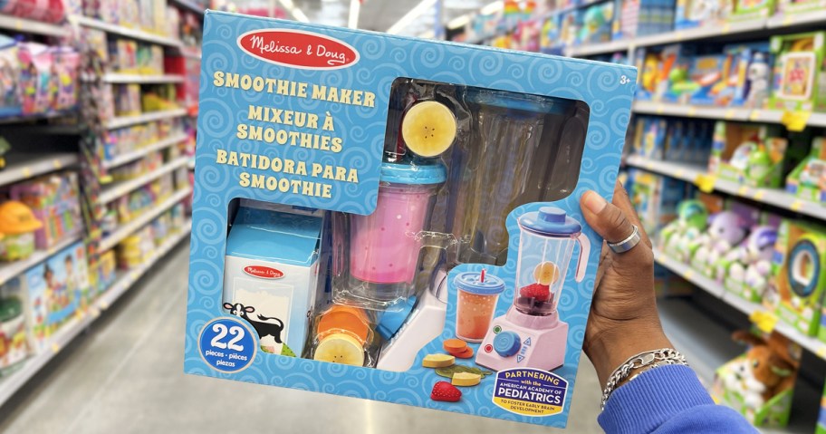 hand holding up Melissa & Doug Smoothie Maker set in store