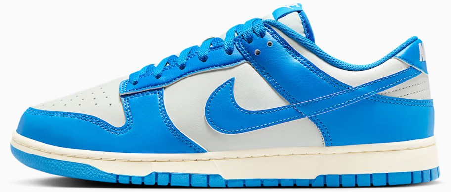 white and blue nike sneaker