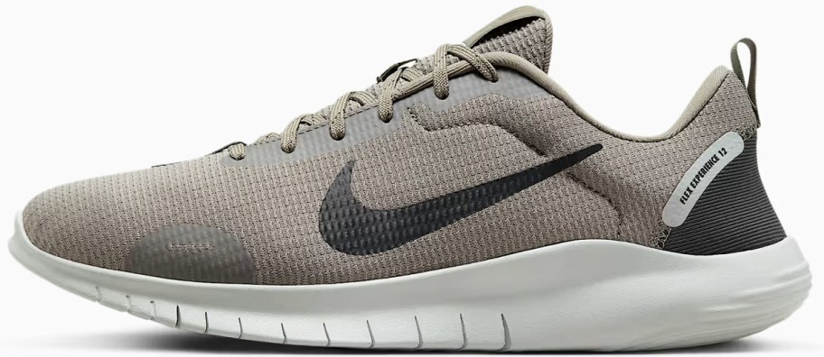 grey and black nike running shoe