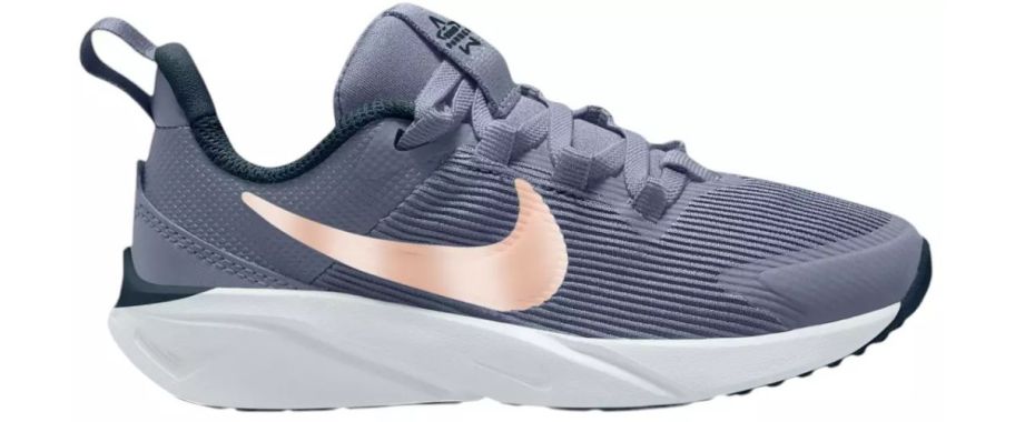 A pink and blue Nike sneaker