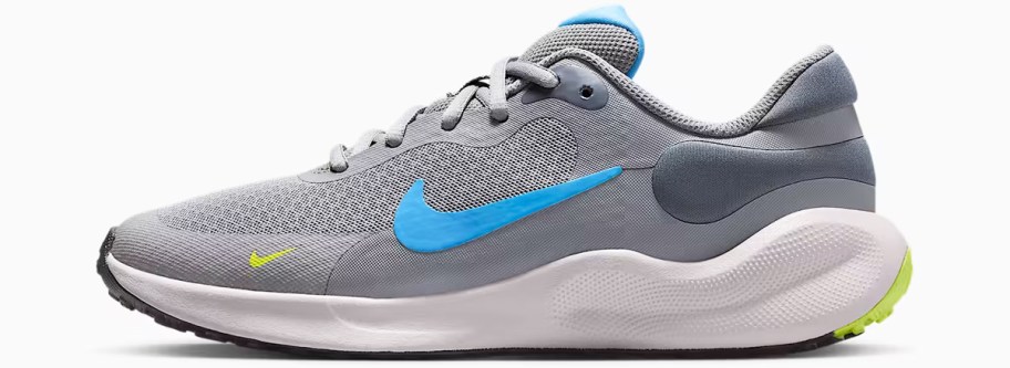 grey and blue nike running shoe