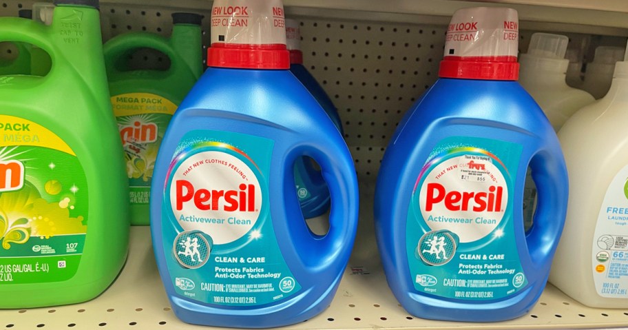 blue bottles of Persil Activewear Clean Liquid Laundry Detergent on store shelf