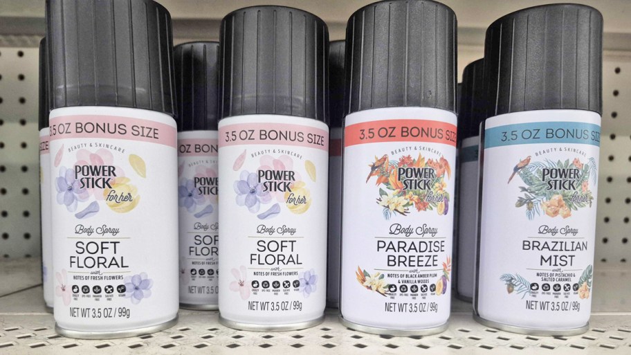 multiple bottles of Power Stick Women's Body Spray on store shelf