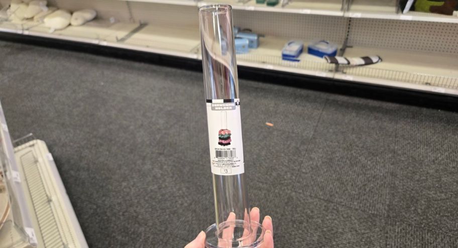 hand holding a Scrunchie Holder at the store
