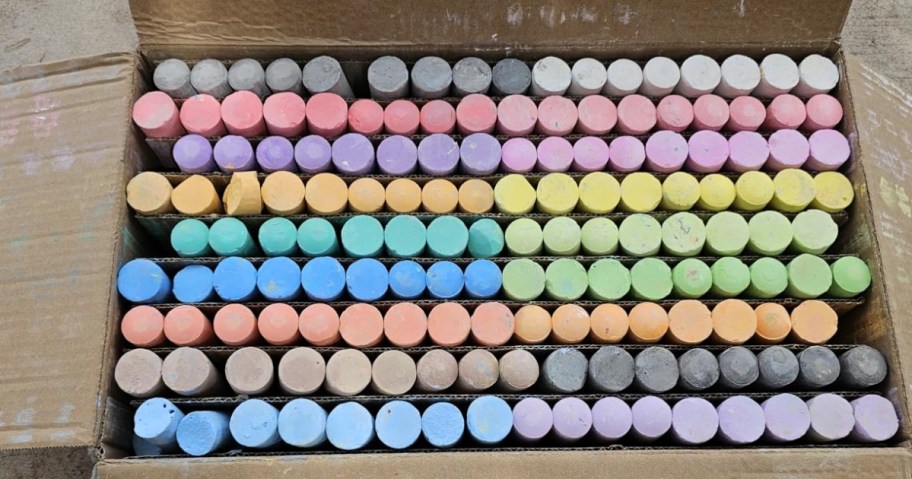 box full of sidewalk chalk in multiple colors