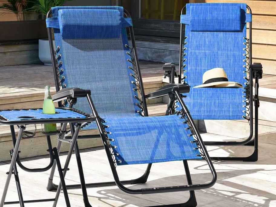 blue anti gravity chairs and matching side table