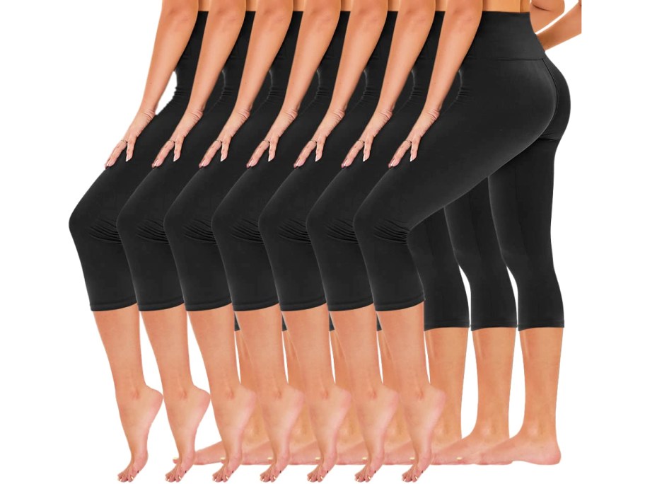 women modeling black pairs of capri leggings