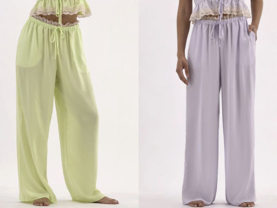 Stock images of two women wearing No Boundaries satin pajama pants