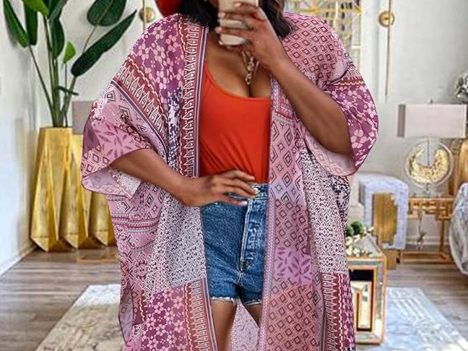 woman weraing patterned kimono over tank and shorts