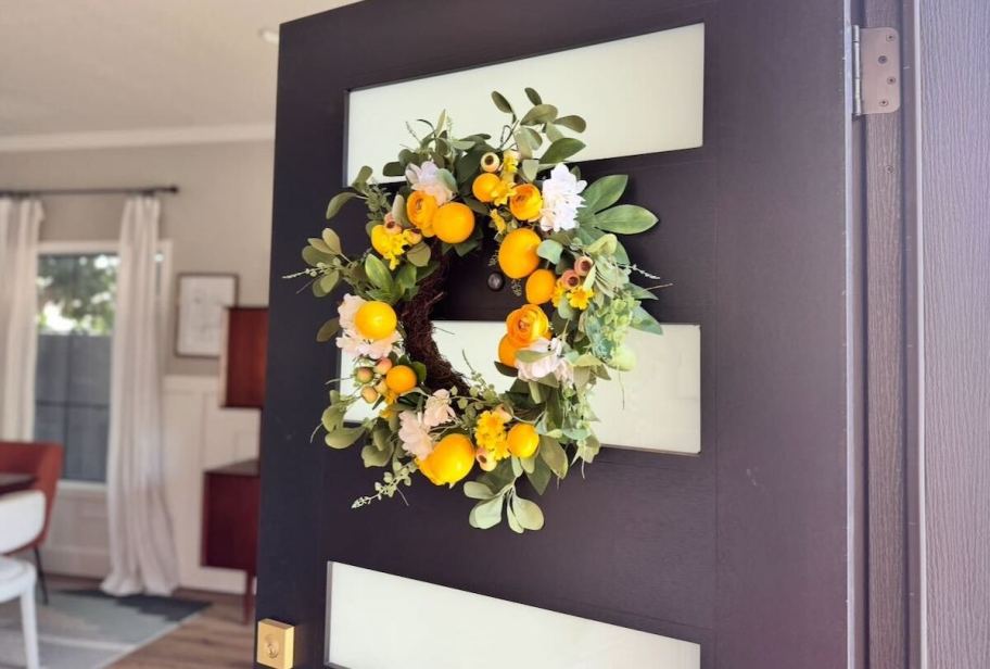 Lemon wreath hanging on front door 