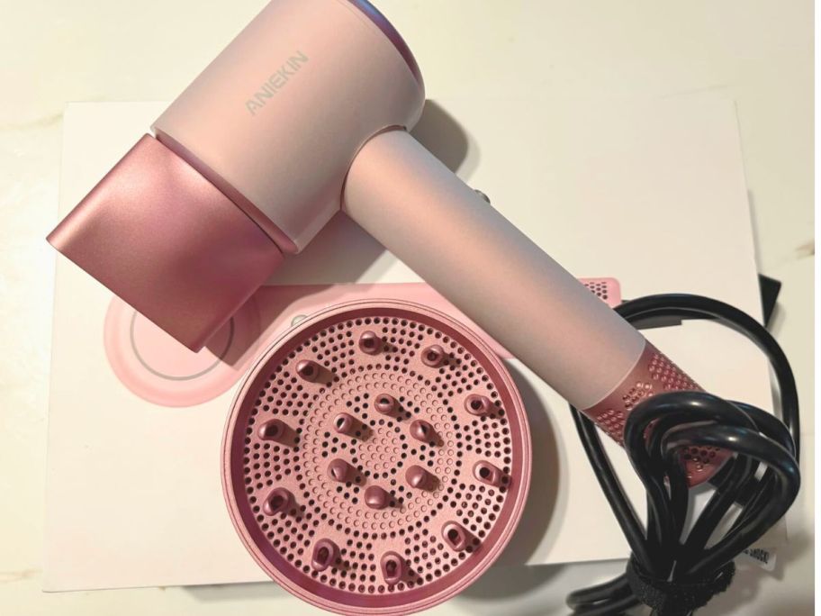 pink blow dryer with diffuser