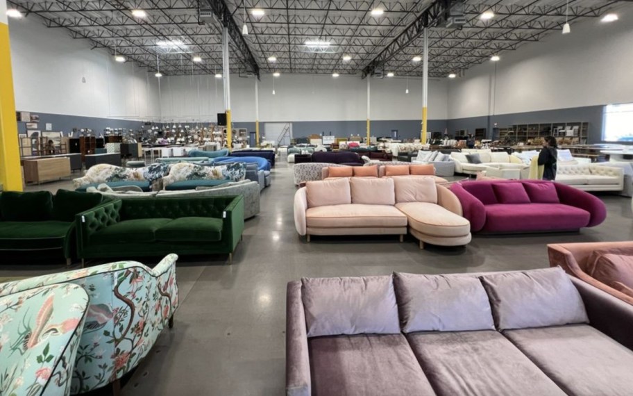 many anthro couches in warehouse