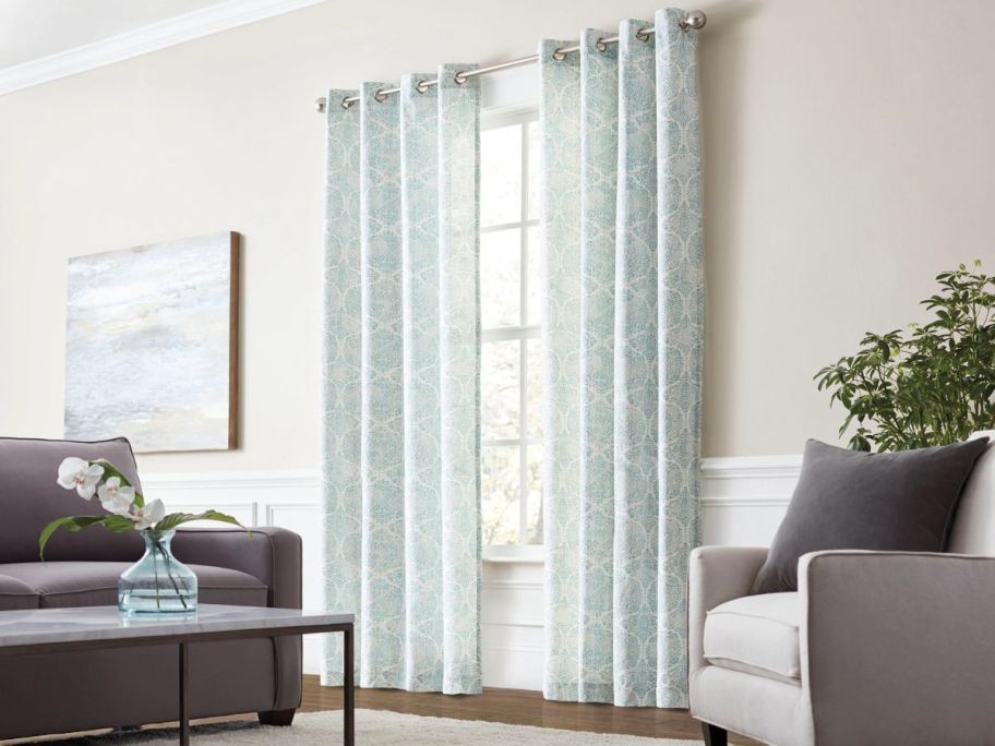allen + Roth 84" Abstract Light Filtering Grommet Single Curtain Panels on window in living room
