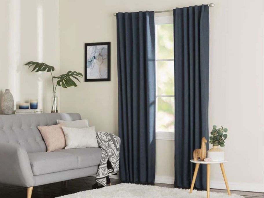 LIVING LOGIC 84" Midnight Blackout Thermal Lined Back Tab Single Curtain Panels on window in living room