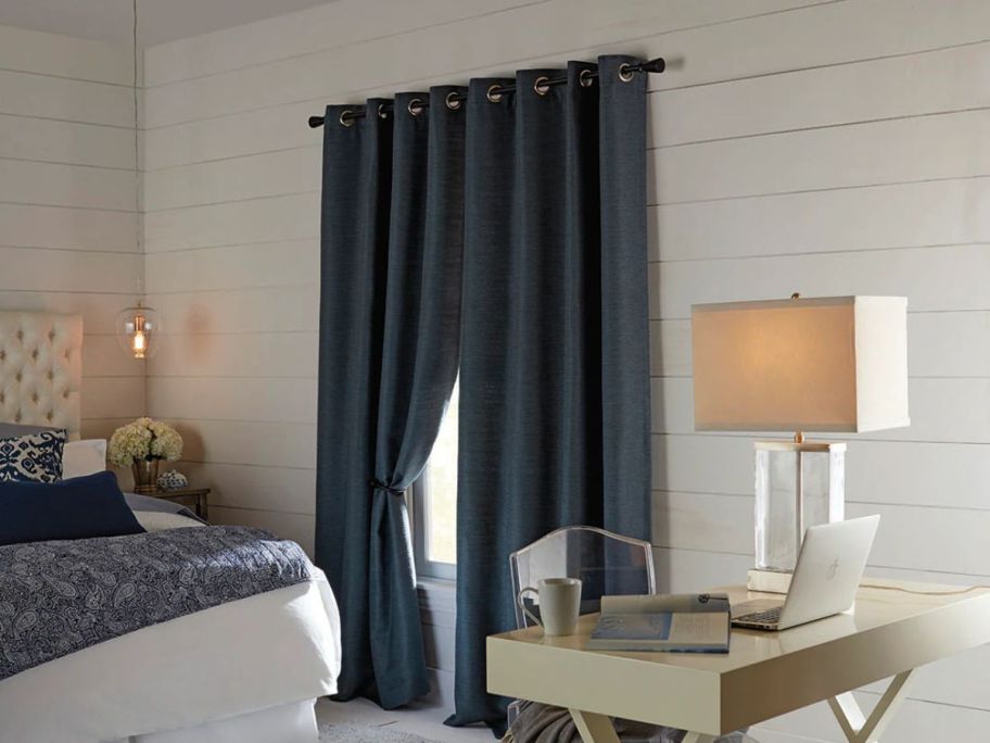 allen + roth 84" Indigo Room Darkening Thermal Lined Grommet Single Curtain Panels on window in bedroom