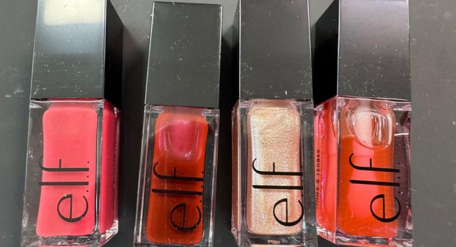 Display of elf lip oil in four different colors