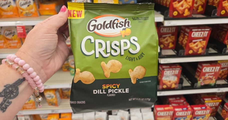 Goldfish Spicy Dill Pickle Cracker bag in hand in store