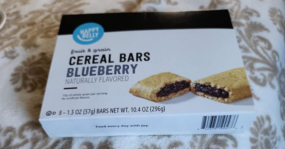 Happy Belly Fruit & Grain blueberry Cereal Bar box on table