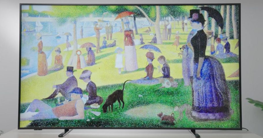 iFFALCON QLED 4K Smart TV with "A Sunday Afternoon on the Island of La Grande Jatte," by Georges Seurat displayed on the screen.