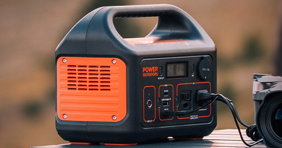 jackery portable power station charging an item