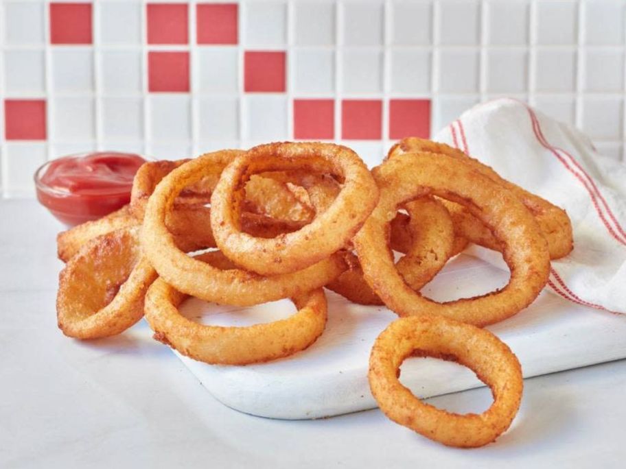 display of onion rings on a white plate 
