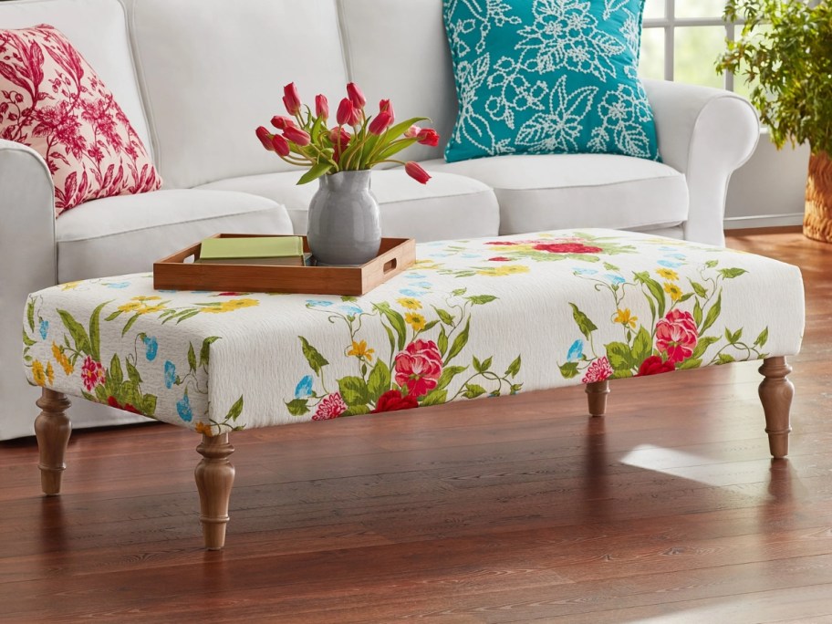 a floral fabric rectangle ottoman bench in a living room