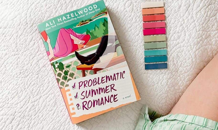 problematic summer romance book on bed