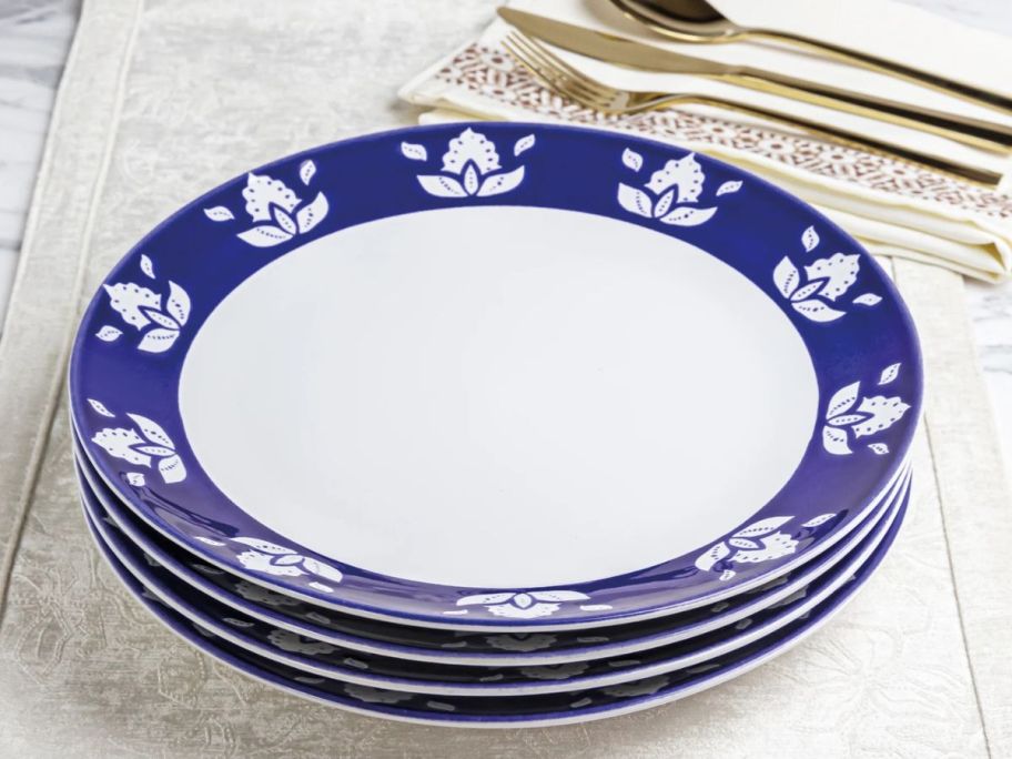 Sofia Home Indigo 4-Piece Round Stoneware Dinner Plates stacked on table